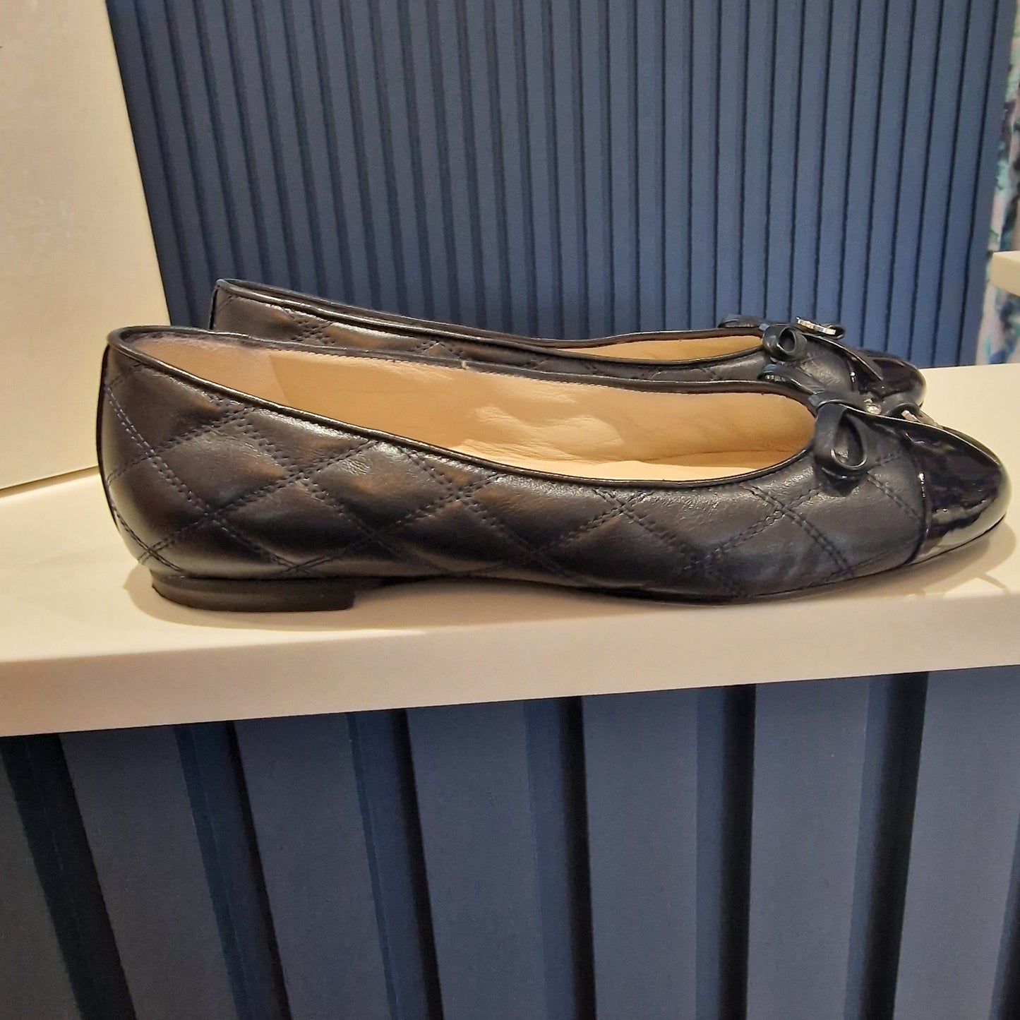 Russell and Bromley Navy quilted leather pumps, size 5/38