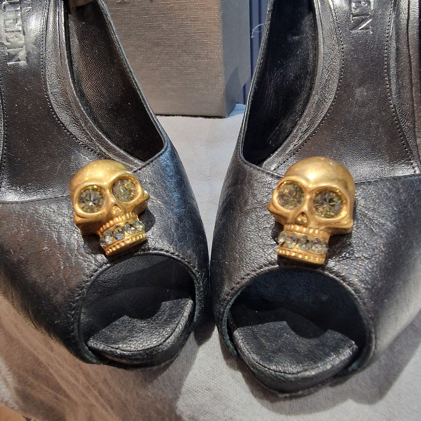 Alexander McQueen black leather peeptoe heels, gold diamante skull hardware, size 6/39