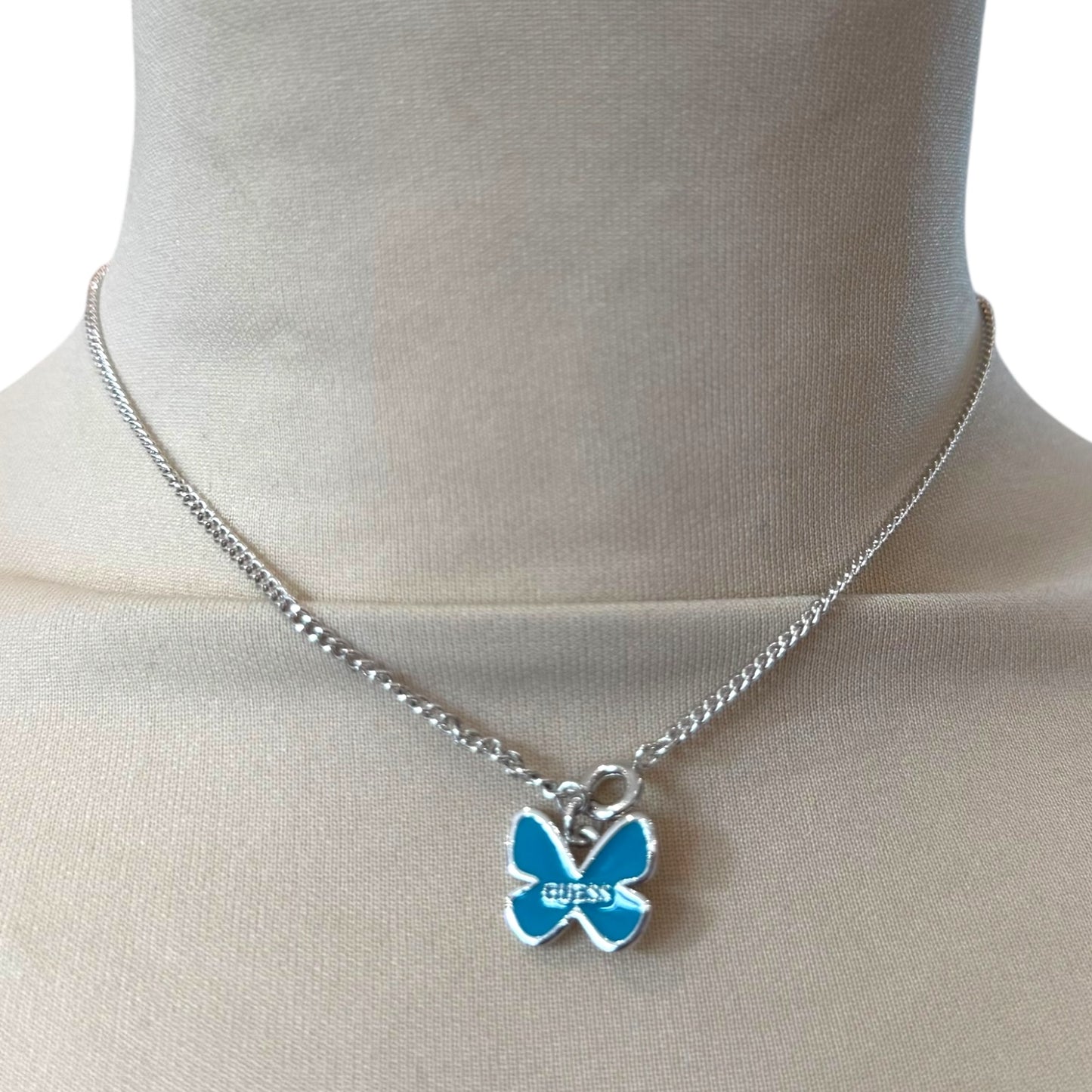 Guess Turquoise and Silver Butterfly Necklace