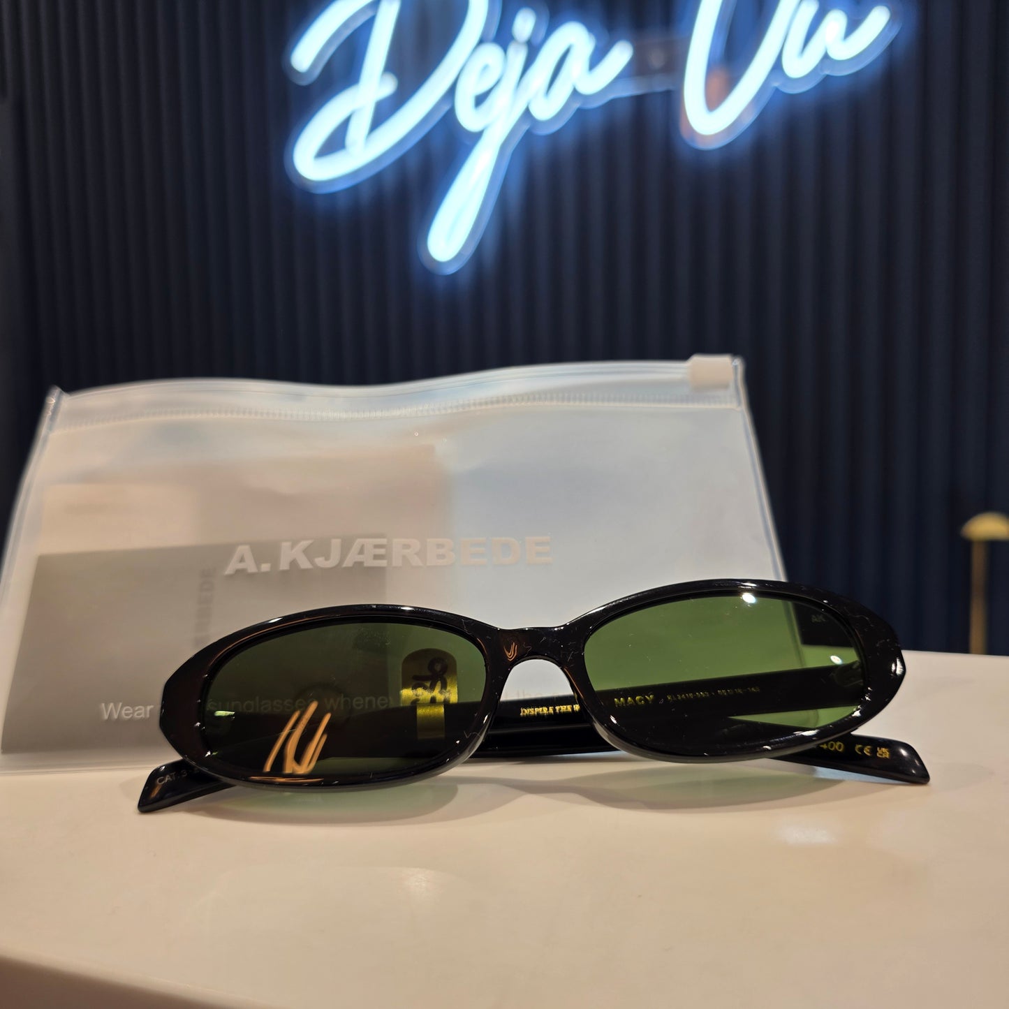 A. KJAERBEDE Black Sunglasses, Green Lens
